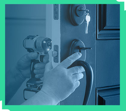 Locksmith working on lock