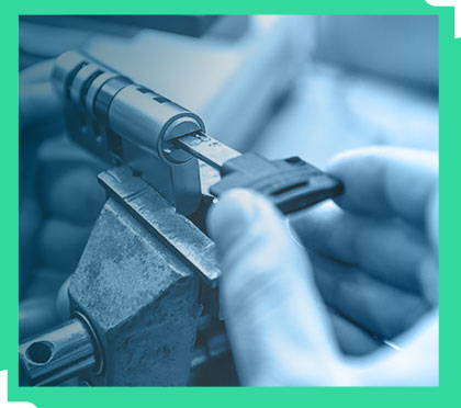 Locksmith working on lock